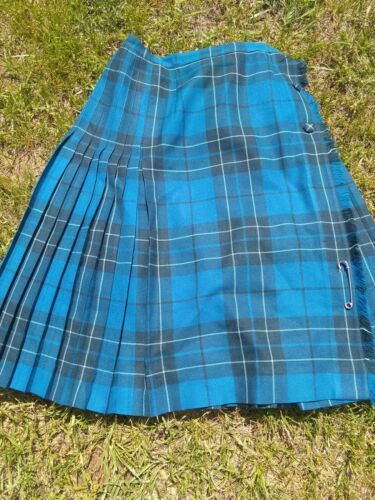 Woman's Blue Plaid Kilt Skirt With Pin